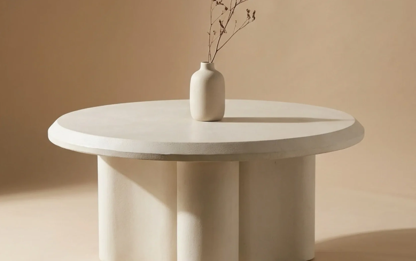Light microcement table with considered proportions